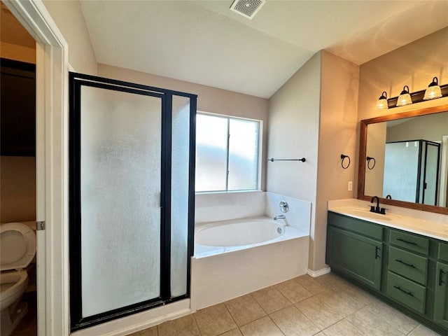 219 Memory Ln, Harker Heights, TX 76548 - bathroom featuring a garden tub, a shower stall, double vanity, tile patterned flooring, and lofted ceiling