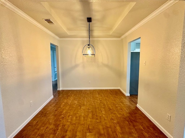 3303 Solomon Dr, Killeen, TX 76542 - unfurnished dining area featuring wood finished floors, a tray ceiling, and ornamental molding