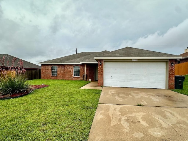 3303 Solomon Dr, Killeen, TX 76542 - ranch-style home with brick siding, concrete driveway, a garage, and roof with shingles