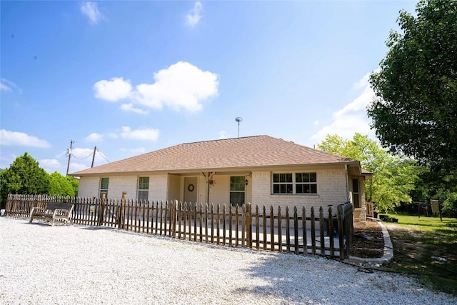 194 Rabbit Trl, Dale, TX 78616 - ranch-style house with brick siding and a fenced front yard