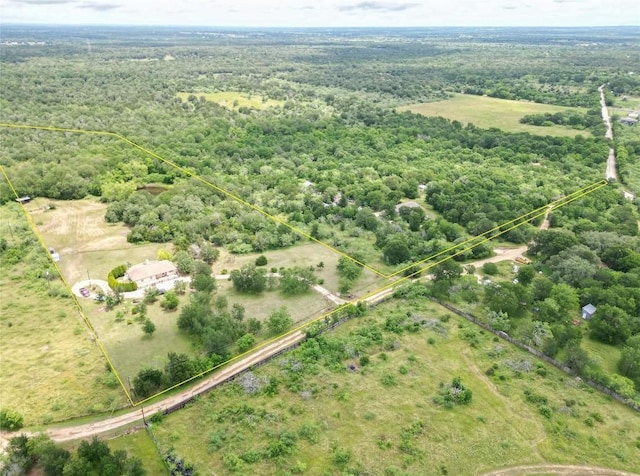 194 Rabbit Trl, Dale, TX 78616 - aerial view of sparsely populated area featuring property parcel outlined and a heavily wooded area