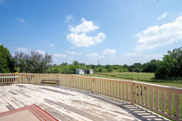 194 Rabbit Trl, Dale, TX 78616 - deck with a shed and view of wooded area
