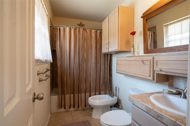 194 Rabbit Trl, Dale, TX 78616 - bathroom featuring vanity, a bidet, shower / bath combo, and plenty of natural light