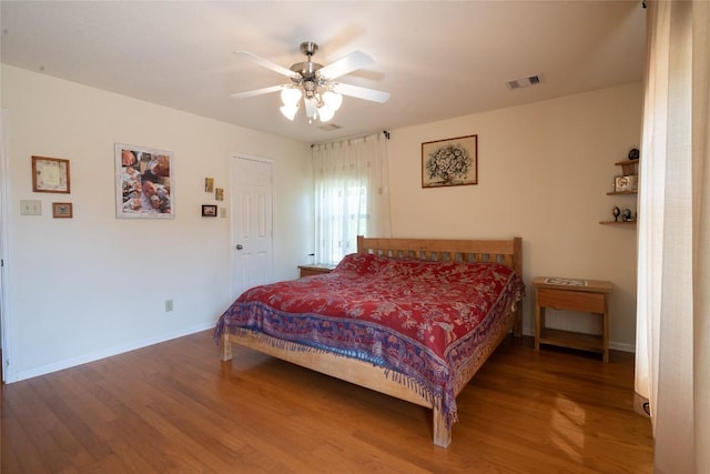 194 Rabbit Trl, Dale, TX 78616 - bedroom with wood finished floors and ceiling fan