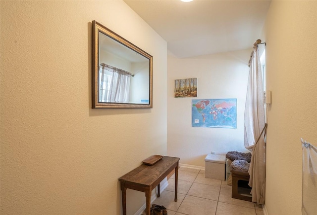194 Rabbit Trl, Dale, TX 78616 - hall featuring light tile patterned flooring and baseboards