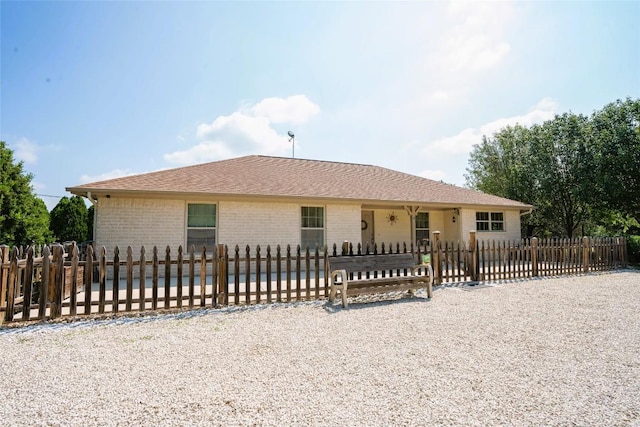 194 Rabbit Trl, Dale, TX 78616 - ranch-style house with a fenced front yard and brick siding