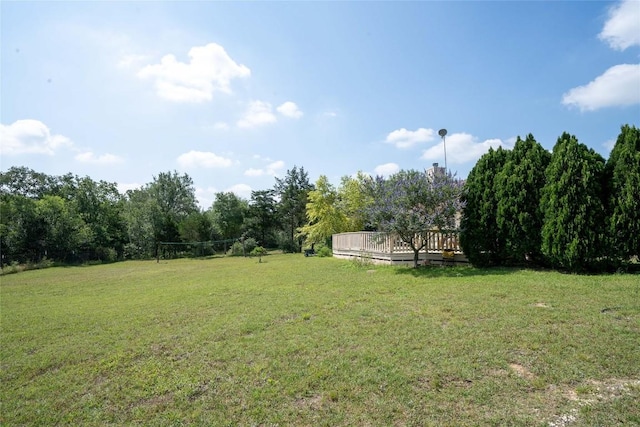194 Rabbit Trl, Dale, TX 78616 - view of grassy yard featuring a wooden deck