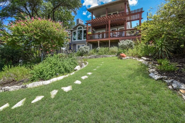 21013 Fawn Ridge Dr, Lago Vista, TX 78645 - back of property with a yard and a wooden deck