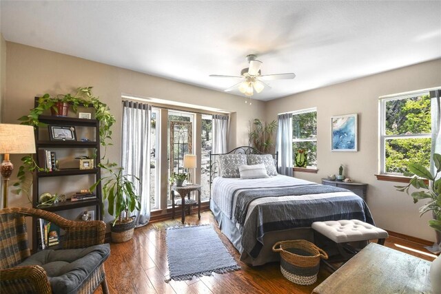 21013 Fawn Ridge Dr, Lago Vista, TX 78645 - bedroom featuring hardwood / wood-style flooring, access to exterior, and a ceiling fan