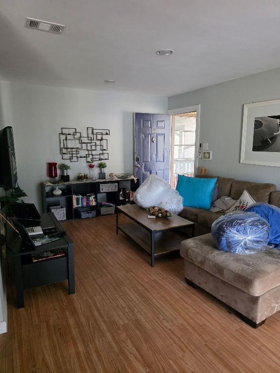 2124 Burton Dr Unit 208, Austin, TX 78741 - living area with wood finished floors