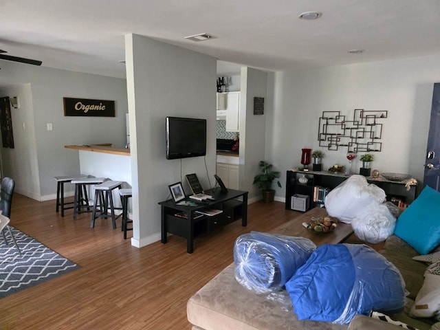 2124 Burton Dr Unit 208, Austin, TX 78741 - living area featuring wood finished floors and a ceiling fan