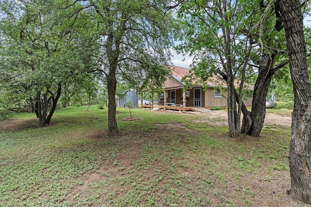 130 Anderson Ln, Red Rock, TX 78662 - view of green lawn featuring covered porch