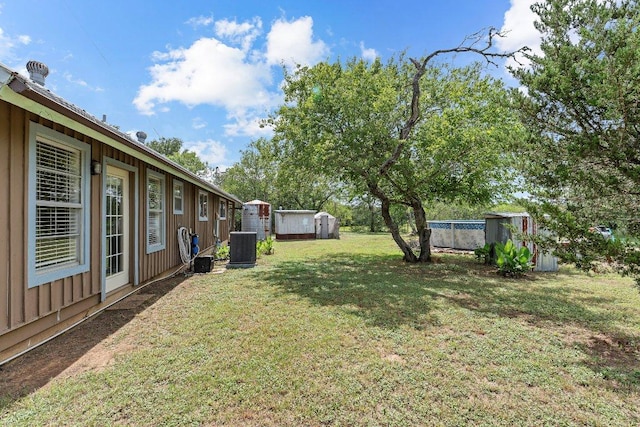 130 Anderson Ln, Red Rock, TX 78662 - view of yard with a storage shed