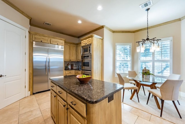 5120 Mansfield View Ct, Austin, TX 78732 - kitchen with built in appliances, light tile patterned floors, ornamental molding, a chandelier, and plenty of natural light