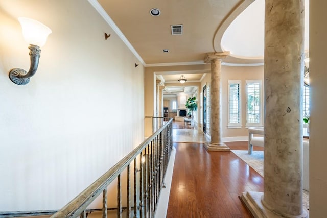 5120 Mansfield View Ct, Austin, TX 78732 - hall featuring ornate columns, ornamental molding, wood finished floors, and recessed lighting