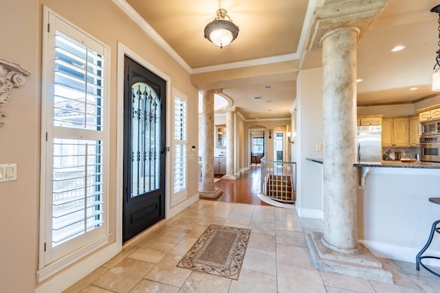 5120 Mansfield View Ct, Austin, TX 78732 - entryway with ornate columns, crown molding, plenty of natural light, and light tile patterned floors