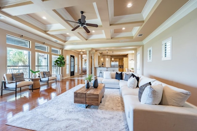 5120 Mansfield View Ct, Austin, TX 78732 - living area featuring decorative columns, ceiling fan, crown molding, light wood-type flooring, and coffered ceiling