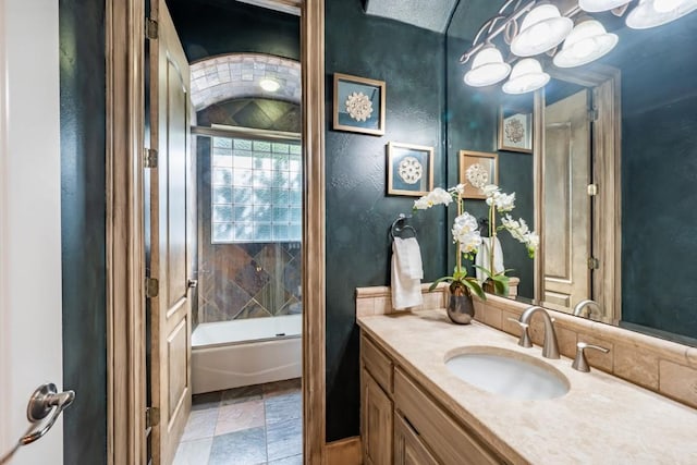 5120 Mansfield View Ct, Austin, TX 78732 - bathroom featuring vanity and stone tile floors