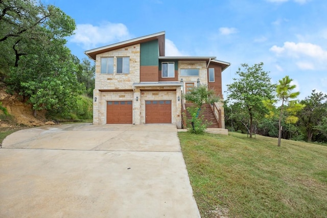 1817 High Lonesome, Leander, TX 78641 - contemporary home with stone siding, an attached garage, concrete driveway, a front yard, and stairs
