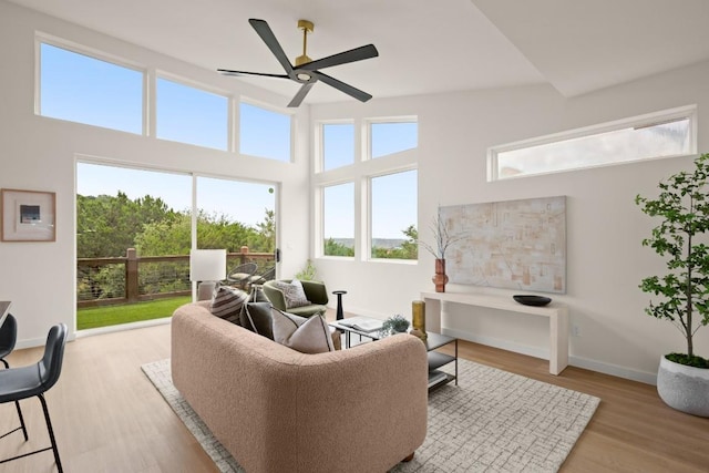 1817 High Lonesome, Leander, TX 78641 - living area featuring a ceiling fan and wood finished floors
