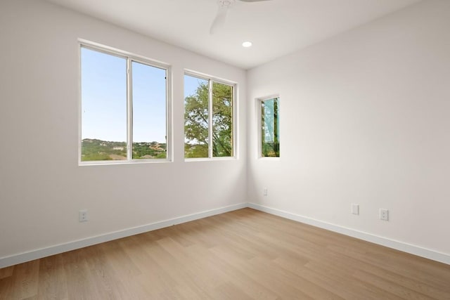 1817 High Lonesome, Leander, TX 78641 - empty room featuring light wood-style flooring, a ceiling fan, and recessed lighting