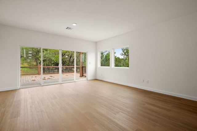 1817 High Lonesome, Leander, TX 78641 - spare room featuring baseboards and light wood-type flooring