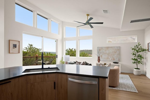 1817 High Lonesome, Leander, TX 78641 - kitchen with dishwasher, ceiling fan, healthy amount of natural light, open floor plan, and high vaulted ceiling