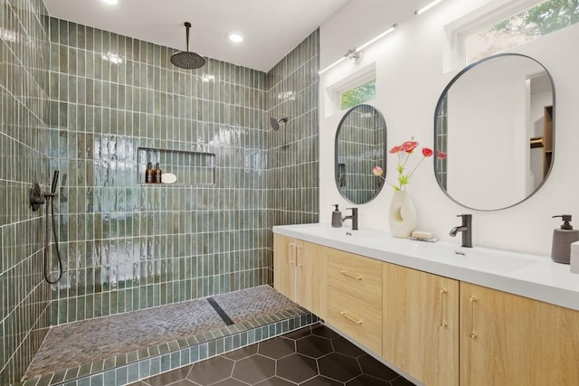 1817 High Lonesome, Leander, TX 78641 - full bathroom with double vanity, tile patterned floors, a walk in shower, healthy amount of natural light, and recessed lighting