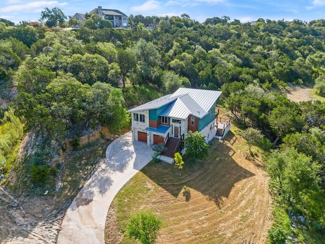 1817 High Lonesome, Leander, TX 78641 - view of subject property featuring a forest