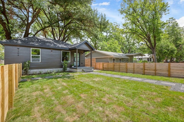 3704 Munson St Unit 1, Austin, TX 78721 - back of house featuring a fenced backyard