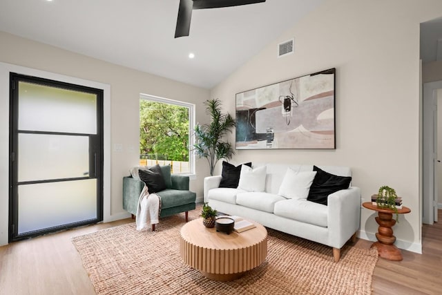 3704 Munson St Unit 1, Austin, TX 78721 - living room with light wood-style floors, ceiling fan, vaulted ceiling, and recessed lighting