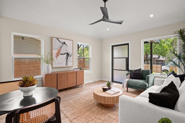 3704 Munson St Unit 1, Austin, TX 78721 - living area featuring light wood-type flooring, recessed lighting, and ceiling fan