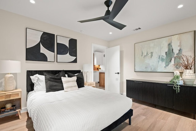 3704 Munson St Unit 1, Austin, TX 78721 - bedroom featuring light wood-style flooring, recessed lighting, and a ceiling fan