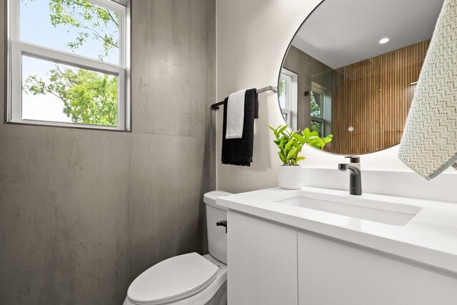 3704 Munson St Unit 1, Austin, TX 78721 - bathroom featuring healthy amount of natural light and vanity