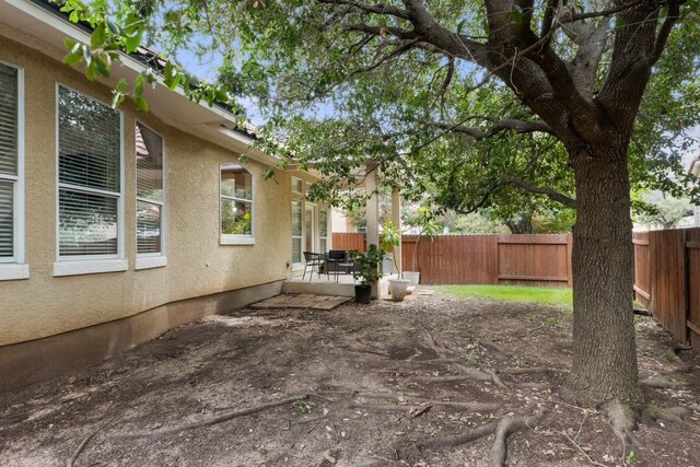 15325 Interlachen Dr, Austin, TX 78717 - fenced backyard with a patio area