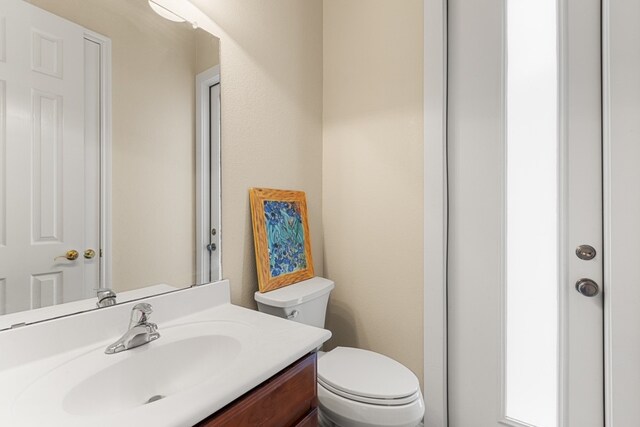 15325 Interlachen Dr, Austin, TX 78717 - half bath featuring toilet and vanity