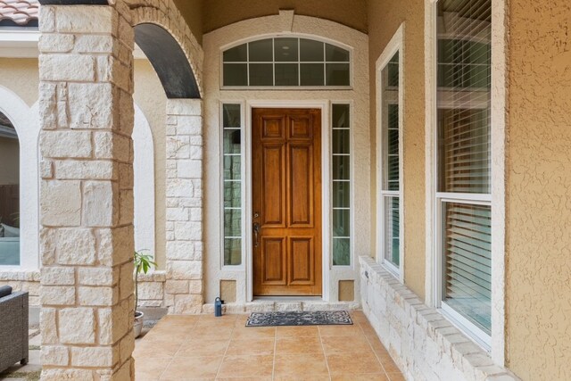 15325 Interlachen Dr, Austin, TX 78717 - entrance to property with stucco siding and stone siding