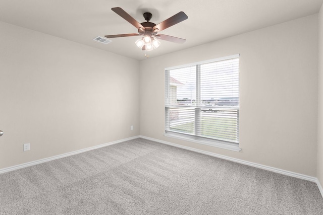817 Coke Rd, Burnet, TX 78611 - carpeted empty room with baseboards and a ceiling fan