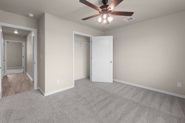 817 Coke Rd, Burnet, TX 78611 - unfurnished bedroom with light carpet, a closet, and a ceiling fan