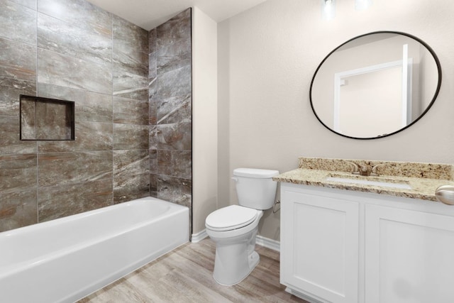 817 Coke Rd, Burnet, TX 78611 - bathroom with wood finished floors, vanity, and shower / washtub combination