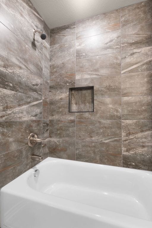 817 Coke Rd, Burnet, TX 78611 - bathroom with shower / washtub combination
