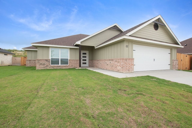 817 Coke Rd, Burnet, TX 78611 - view of front facade with brick siding, board and batten siding, concrete driveway, a garage, and a shingled roof