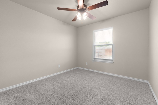 817 Coke Rd, Burnet, TX 78611 - carpeted spare room featuring baseboards and a ceiling fan