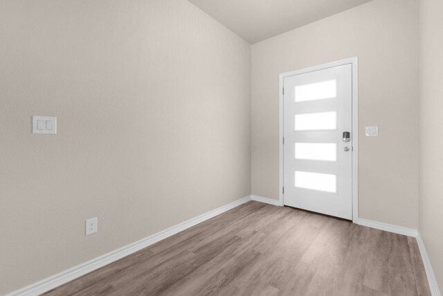 817 Coke Rd, Burnet, TX 78611 - entrance foyer featuring wood finished floors and baseboards