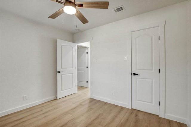 1402 Valleyridge Cir Unit B, Austin, TX 78704 - unfurnished bedroom featuring light wood finished floors and ceiling fan