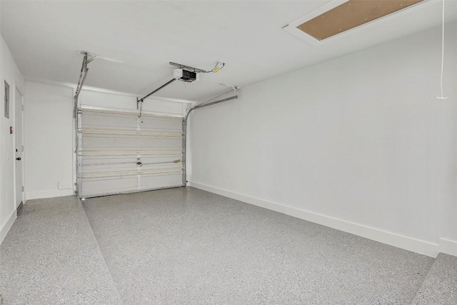 1402 Valleyridge Cir Unit B, Austin, TX 78704 - garage featuring a garage door opener and baseboards