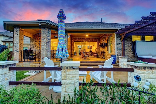 2817 Mossy Springs Dr, Leander, TX 78641 - patio terrace at dusk featuring covered porch