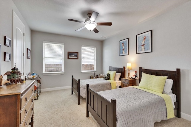 2817 Mossy Springs Dr, Leander, TX 78641 - bedroom with light carpet and a ceiling fan