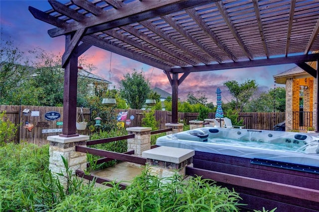 2817 Mossy Springs Dr, Leander, TX 78641 - fenced backyard featuring a hot tub and a pergola