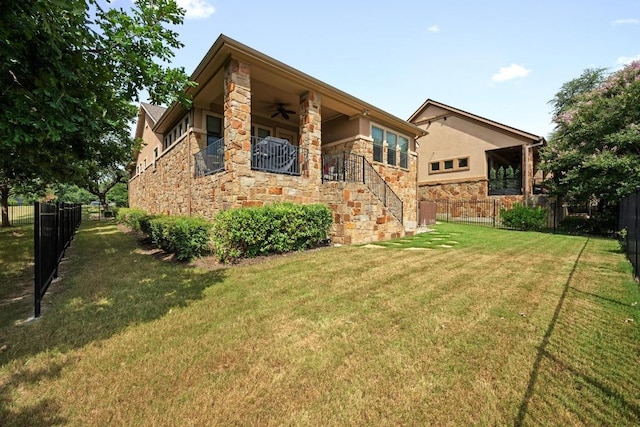 29 Prestonwood Cir, Lakeway, TX 78734 - rear view of house with ceiling fan, stone siding, stairs, and stucco siding